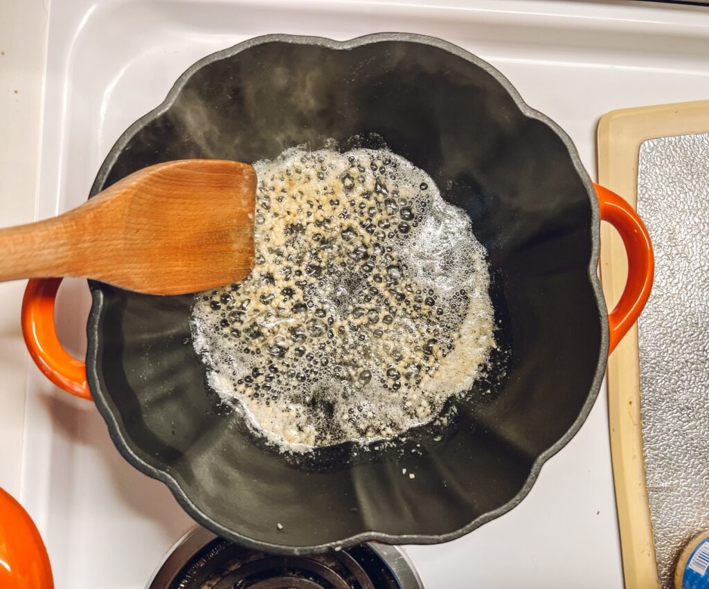 Melting better and garlic in a dutch oven